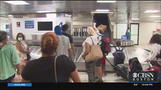 Travelers At Logan Airport Prepare To Comply With Mass. Travel Order