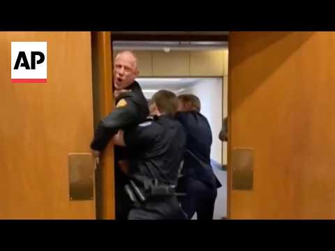 GOP senator and police drag Marine veteran protesting Iran war out of Senate hearing