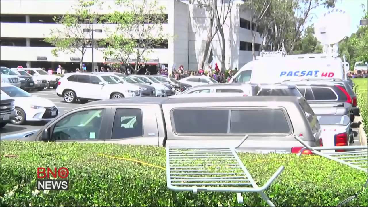 Several hundred anti-Trump protesters break through steel barricades at California rally