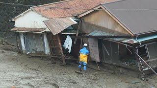 Rescuers search for survivors in landslide-hit Japan town | AFP