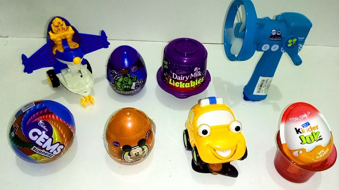 Eggs Surprise chocolate and toys & Barbie, Kinder joy, Cadbury
