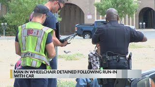 Man in wheelchair arrested after allegedly pulling gun on driver