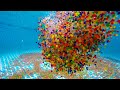 1 Million Orbeez Dropping Into and Out of a Swimming Pool