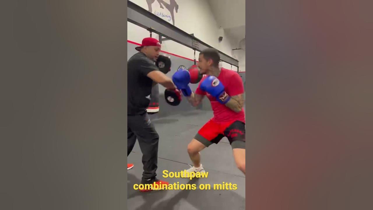Southpaw boxing combinations on mitts . YouTube