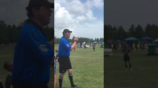 Ref reprimanding competitive soccer parents