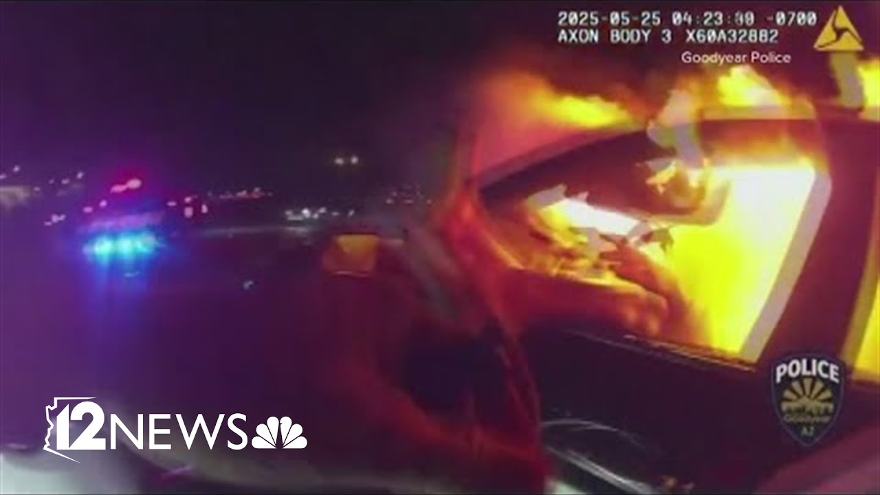 Goodyear police officer rescues woman from burning car - YouTube