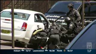 Riot Squad swoop to end standoff outside NSW Parliament