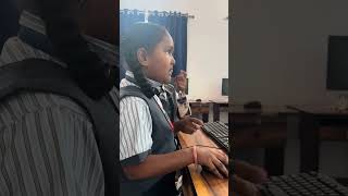 First-grade students learning to code
