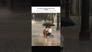 PROTECTING HIM UNDER THE UMBRELLA IN THE STORM 🌧️☂️|| #eva #mom #rain #storm #Shortviral