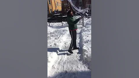Hot Water Drops on Man Doing Boiling to Frozen Water Trick - 1022129
