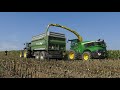 Big silage in slow motion  john deere 9800 and 3x claas jaguar