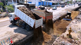 Adding more rock soils for scattering into foundation road excellence skill with bulldozer cat d4c