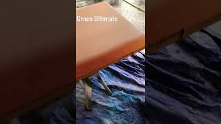 Spray painting doors with the Graco Ultimate paint gun.