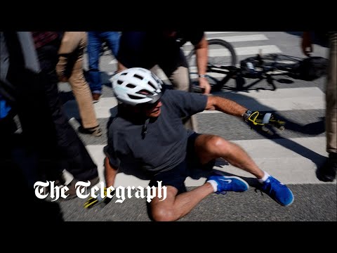 Joe Biden falls off bike while cycling in Delaware