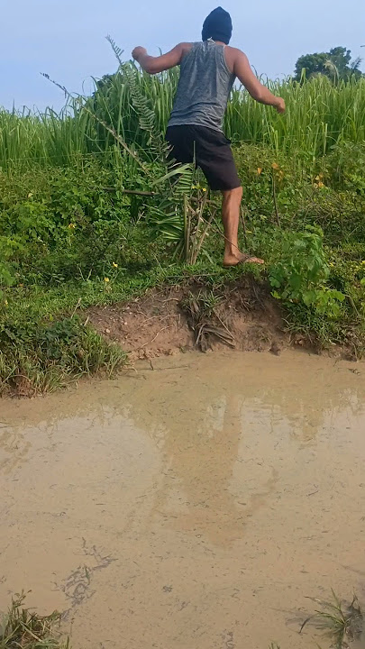 Man Slips Into Muddy Water