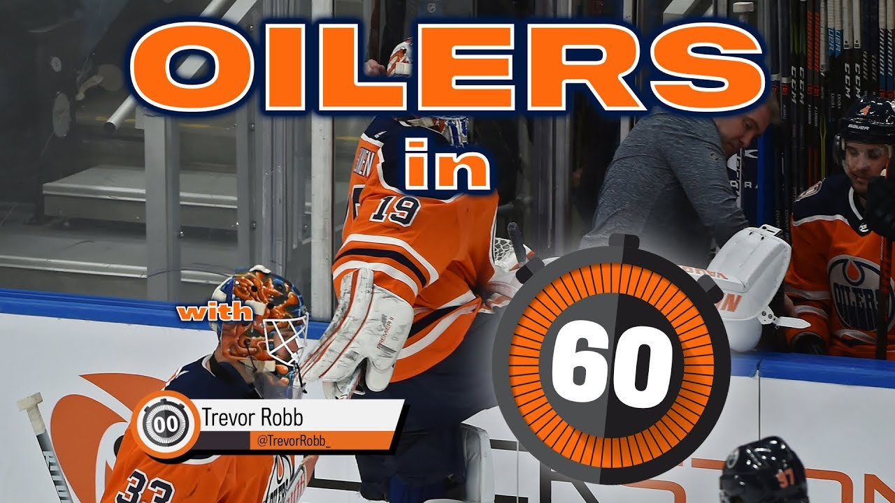 oilers fan throws jersey on ice