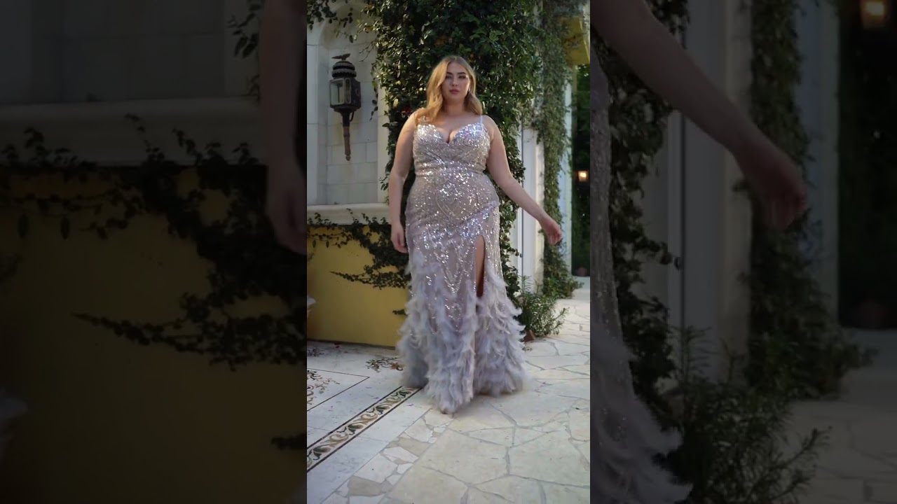 Beaded mermaid gown with feather details 🤍 