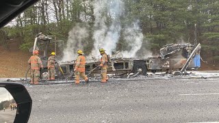 Georgia Aquarium bus catches fire on I-285, only skeleton and wheels remain