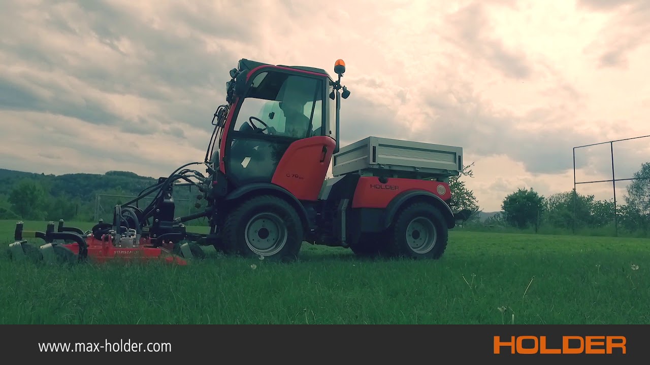 Ein Holder zum Mähen und Mulchen