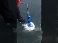 Drilling Ice Fishing Holes