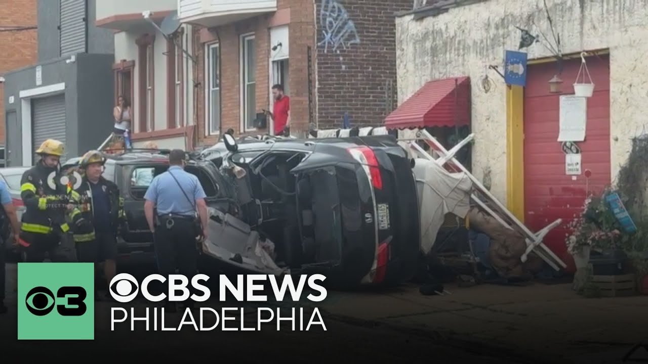 1 person taken to the hospital after car flips over on sidewalk in ...