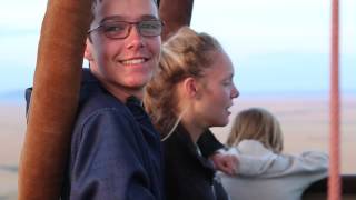 Flying over a roaring lion in a hot air balloon, Masai Mara