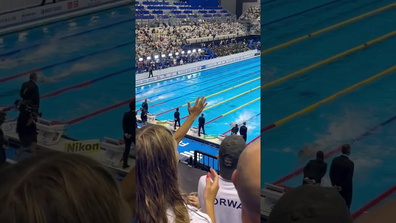 World Title Won by 0.02 in the 400 Free