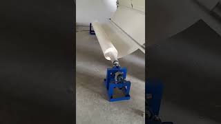 Double Fabric Roll Packing Machine... With Hydraulic Edge Condrol.