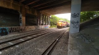 FEC 206 the rock train highballing under hwy US1 in Titusville