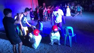 Sack race wearing helmet...