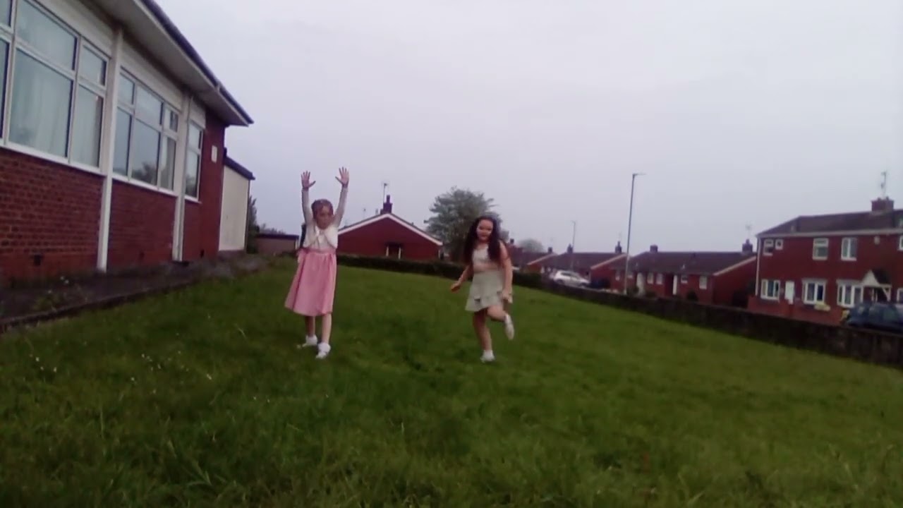 me and my friend doing handstands,cartwheels and rolypoly