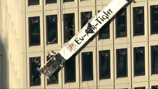 2 workers rescued from dangling high-rise scaffolding in Baltimore after blast; several hurt