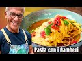 FETTUCCINE ALL’UOVO CON GAMBERI CRUDI FONDO DI CROSTACEI, POMODORO CONCASSE’ E BASILICO