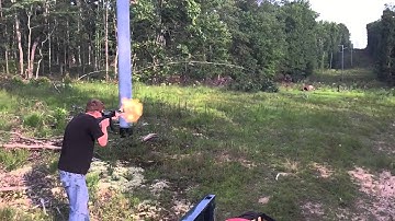 AK47 shooting exploding target (iPhone 6 slow-motion)