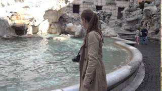 Me throwing a coin and making a wish into Trevi Fountain