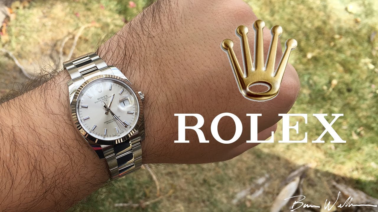 36mm rolex on man's wrist