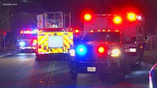 Woman and child rescued from car after crash