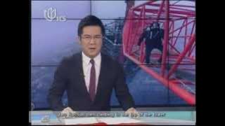 RUSSIAN PAIR CLIMBS SHANGHAI TOWER