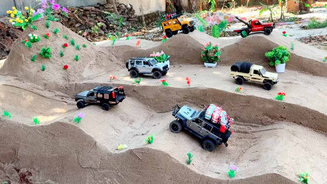 RC MN128 Jeep Rubicon vs RC MN82 Defender vs RC MN Tank 300 Sand Mountain Challenge!