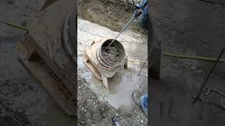 Mixing 60Lb Bags Of Concrete In A Bucket