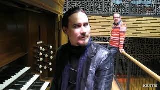 Tuomas Holopainen playing church organ.