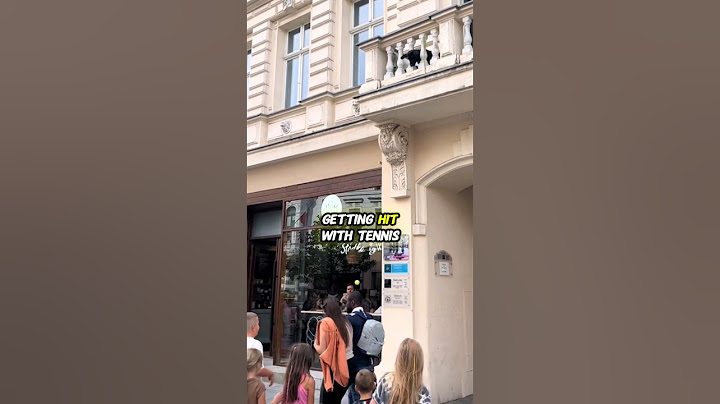 This Dog Hits People With a Tennis Ball From Balcony