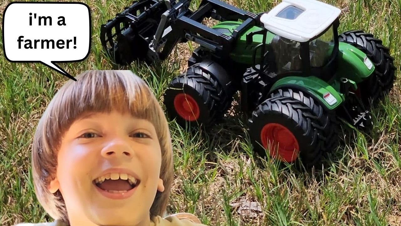 I am a farmer checking out farm RC tractor toy with trailer!!!