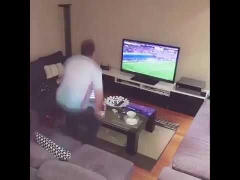 wife-pranks-football-mad-husband-by-turning-the-tv-on-and-off-via-hidden-remote..-the-ending..😅