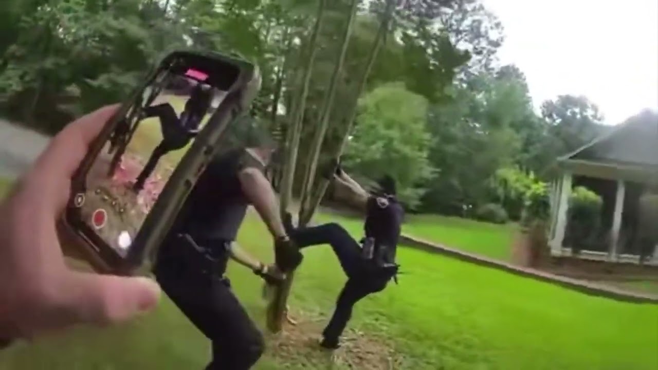 Alabama Officers Free Coyote Trapped in Tree