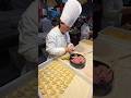Preparing Chinese Dumplings. Street Food in Italy