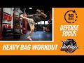 Intense 30 minute muay thai kickboxing heavy bag workout focused on defense 35