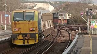 # Network Rail Train passing through Lewes platform 1 and heading off to Ore #