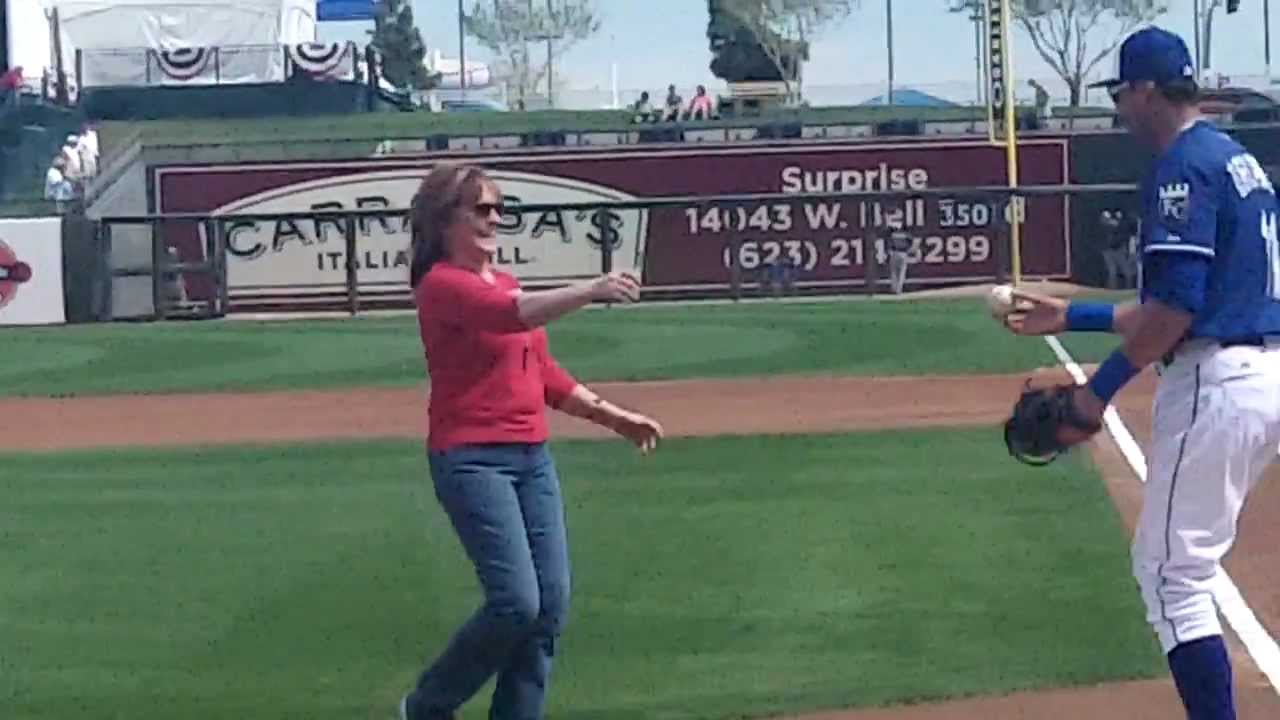 MAM CEO Margy Bons throws out first pitch during a spring training game.