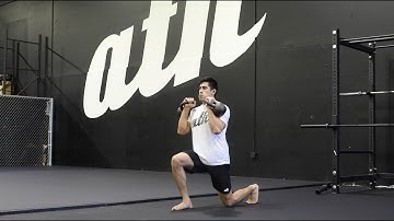 Double Kettlebell Reverse Lunge